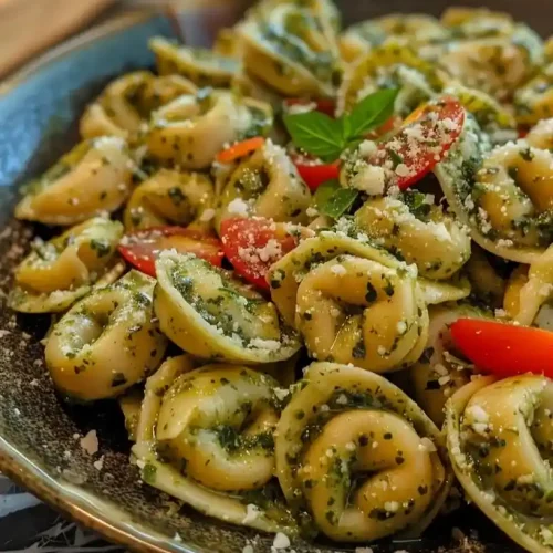 pesto tortellini pasta salad on a plate