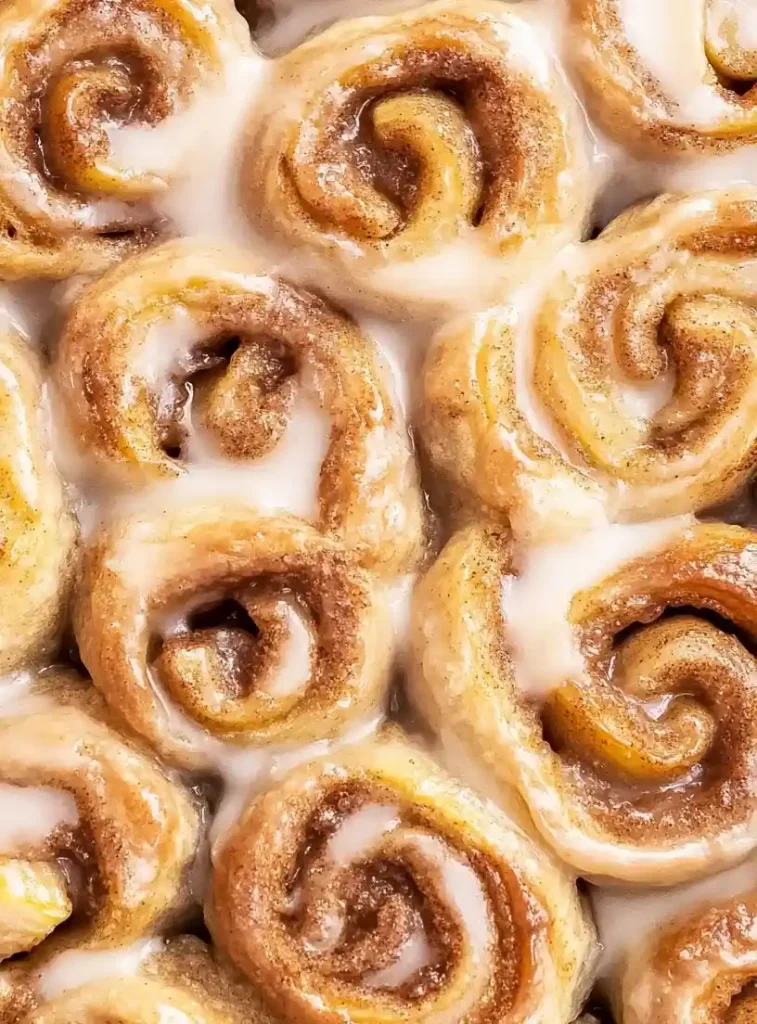 close up apple pie cinnamon roll bake